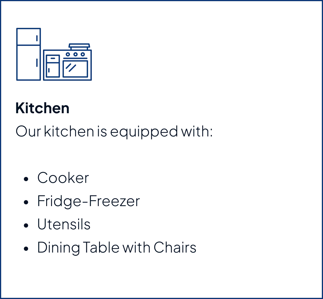Kitchen with counters, cabinets, and window light.
