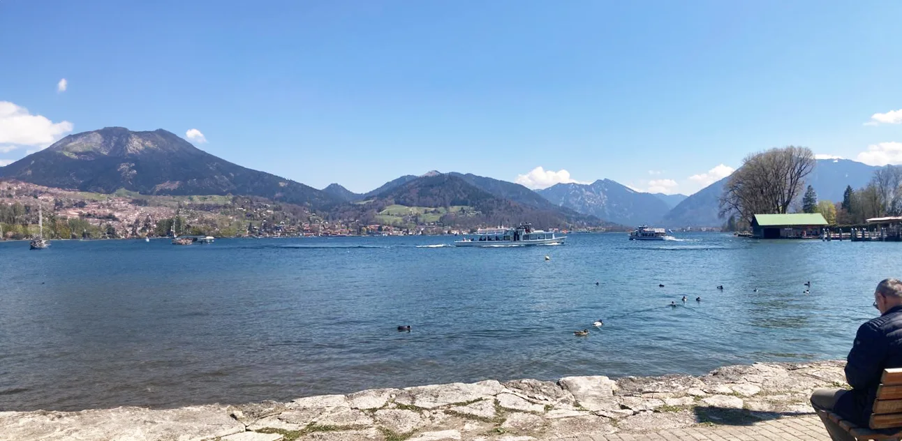 Lake Tegernsee with mountains beyond.