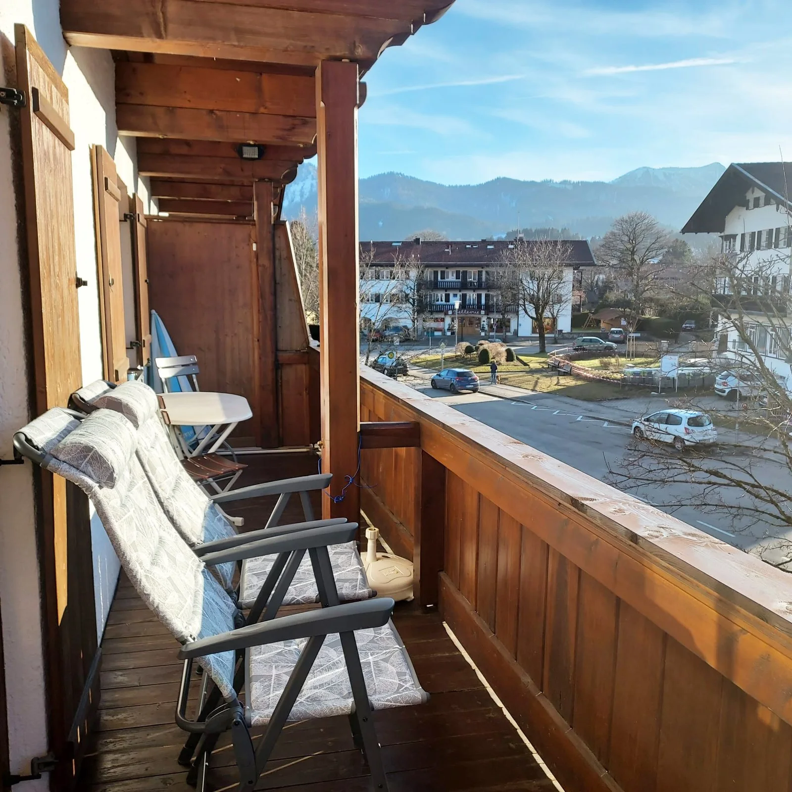 Balcony seating looking out toward the alpine landscape.